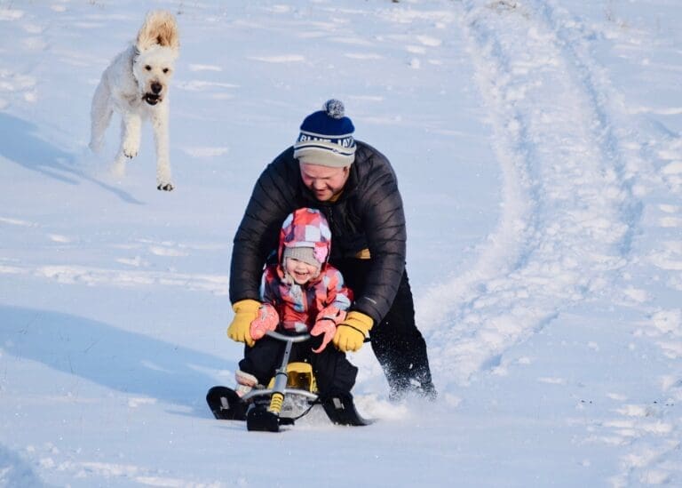 2019 Photo Contest dad and girl toboganning Laurie Sandboe 768x549